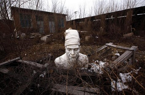 A bust of Confucius rests at an abandoned workshop in the town of Dangcheng in Quyang county.