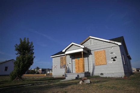 A damaged home is seen in Joplin A damaged home is seen in Joplin