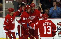 Detroit Red Wings' Bertuzzi celebrates with his teammates after he scored against the Winnipeg Jets during the first period of their NHL hoc
