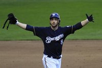 Milwaukee Brewers' Ryan Braun celebrates his 2 RBIs against the St. Louis Cardinals in the 5th inning of Game 1 in the MLB National League C