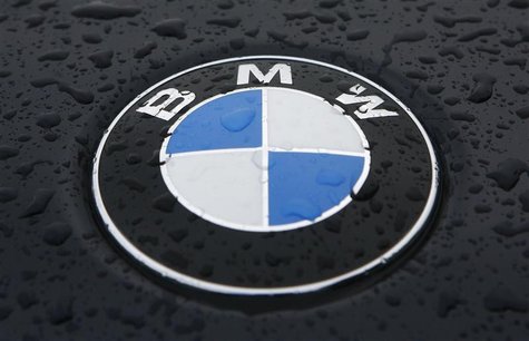 Raindrops are seen on the BMW car in Munich Raindrops are seen on the BMW car in Munich