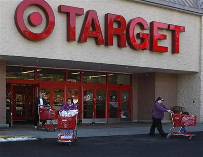 Shoppers exit a Target store with their purchases in Fairfax Shoppers exit a Target store with their purchases in Fairfax