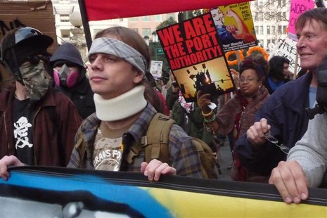 Marine veteran Olsen leads demonstrators during the Occupy movements' attempts to shut down West Coast ports in Oakland Marine veteran Olsen leads demonstrators during the Occupy movements' attempts to shut down West Coast ports in Oakland