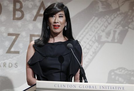 Andrea Jung, CEO of Avon Products Inc., accepts the Leadership in the Corporate Sector award during the Clinton Global Citizen Award ceremon