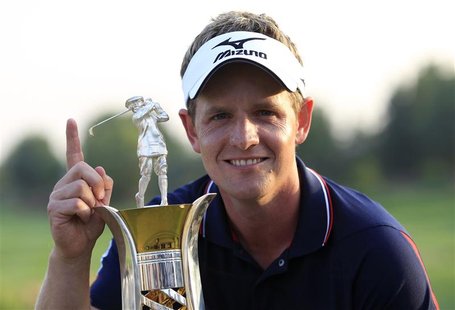 Donald of England poses with the Race to Dubai trophy after the final round of the Dubai World Championship in Dubai Donald of England poses with the Race to Dubai trophy after the final round of the Dubai World Championship in Dubai
