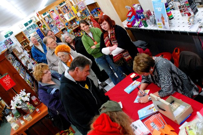 Lori Moore brings the Potluck Pals to Westlake Drug on Portage Rd to raise funds for the YWCA Domestic Abuse Shelter - and raise funds they did - $2165! 12/14/11