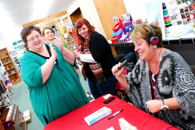 Lori Moore brings the Potluck Pals to Westlake Drug on Portage Rd to raise funds for the YWCA Domestic Abuse Shelter - and raise funds they did - $2165! 12/14/11