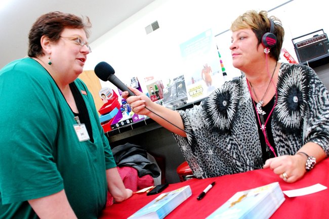 Lori Moore brings the Potluck Pals to Westlake Drug on Portage Rd to raise funds for the YWCA Domestic Abuse Shelter - and raise funds they did - $2165! 12/14/11