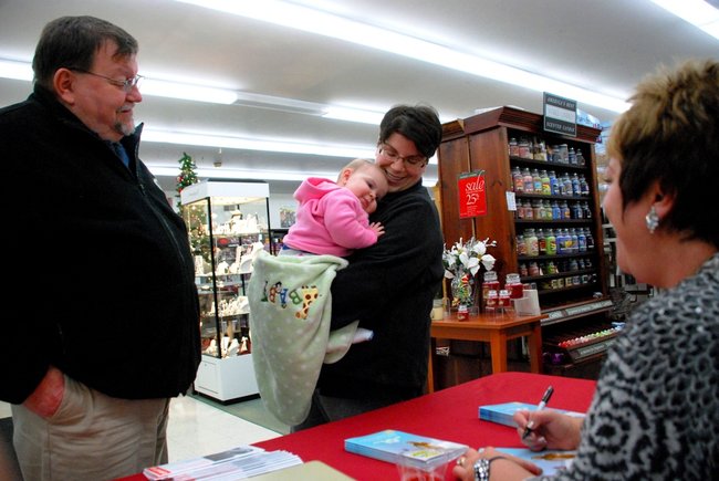 Lori Moore brings the Potluck Pals to Westlake Drug on Portage Rd to raise funds for the YWCA Domestic Abuse Shelter - and raise funds they did - $2165! 12/14/11