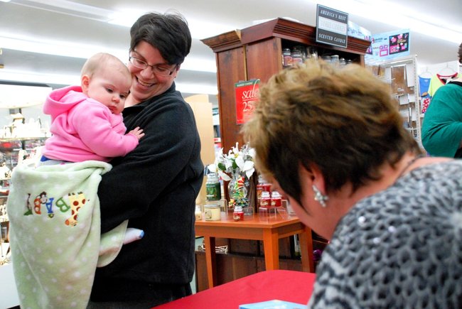 Lori Moore brings the Potluck Pals to Westlake Drug on Portage Rd to raise funds for the YWCA Domestic Abuse Shelter - and raise funds they did - $2165! 12/14/11