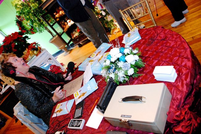 Lori Moore and the Potluck Pals set up camp at Seiverts Floral to rally support for the Kalamazoo Holiday Food Drive - 12/15/11.  The Pals chipped in to the tune of $1438!