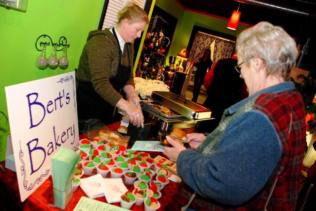 Lori Moore and the Potluck Pals set up camp at Seiverts Floral to rally support for the Kalamazoo Holiday Food Drive - 12/15/11.  The Pals chipped in to the tune of $1438!
