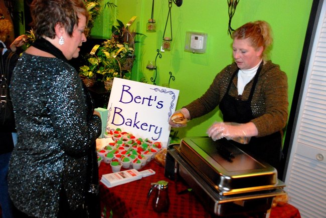 Lori Moore and the Potluck Pals set up camp at Seiverts Floral to rally support for the Kalamazoo Holiday Food Drive - 12/15/11.  The Pals chipped in to the tune of $1438!