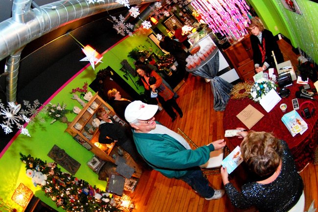 Lori Moore and the Potluck Pals set up camp at Seiverts Floral to rally support for the Kalamazoo Holiday Food Drive - 12/15/11.  The Pals chipped in to the tune of $1438!
