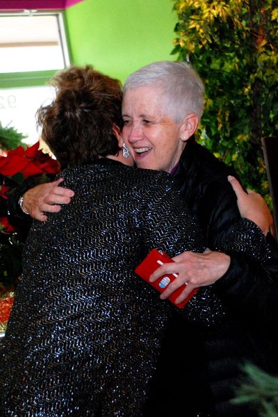Lori Moore and the Potluck Pals set up camp at Seiverts Floral to rally support for the Kalamazoo Holiday Food Drive - 12/15/11.  The Pals chipped in to the tune of $1438!