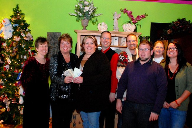 Lori Moore and the Potluck Pals set up camp at Seiverts Floral to rally support for the Kalamazoo Holiday Food Drive - 12/15/11.  The Pals chipped in to the tune of $1438!