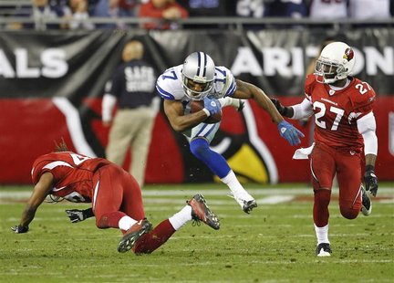 Dallas Cowboys wide receiver Hurd looks for a first down against the Arizona Cardinals in the third quarter during an NFL game in Glendale, Dallas Cowboys wide receiver Hurd looks for a first down against the Arizona Cardinals in the third quarter during an NFL game in Glendale,