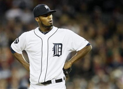 Detroit Tigers relief pitcher Al Alburquerque reacts after called for a balk which scored New York Yankees' Alex Rodriguez during the fifth Detroit Tigers relief pitcher Al Alburquerque reacts after called for a balk which scored New York Yankees' Alex Rodriguez during the fifth