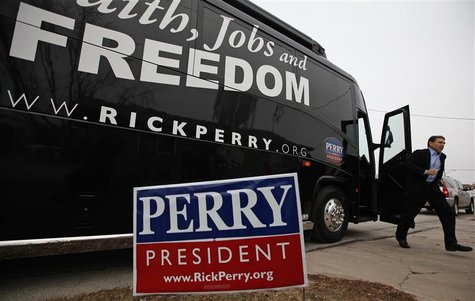 U.S. Republican Presidential candidate and Texas Governor Rick Perry steps off his bus on his way to a campaign stop in Storm Lake, Iowa U.S. Republican Presidential candidate and Texas Governor Rick Perry steps off his bus on his way to a campaign stop in Storm Lake, Iowa
