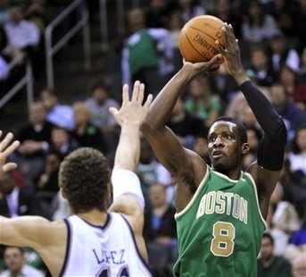 Boston Celtics' Green lofts shot over New Jersey Nets' Lopez in their NBA basketball game in Newark Boston Celtics' Green lofts shot over New Jersey Nets' Lopez in their NBA basketball game in Newark