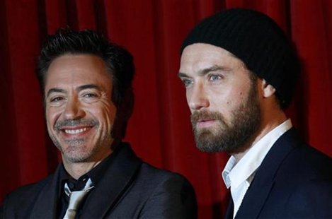 U.S. actor Downey Jr. and British actor Law pose for photographers at the premiere of "Sherlock Holmes: A Game of Shadows" at the Empire Cin U.S. actor Downey Jr. and British actor Law pose for photographers at the premiere of "Sherlock Holmes: A Game of Shadows" at the Empire Cin
