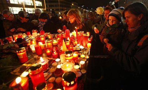 People light candles in tribute to late former Czech President Havel in Prague People light candles in tribute to late former Czech President Havel in Prague