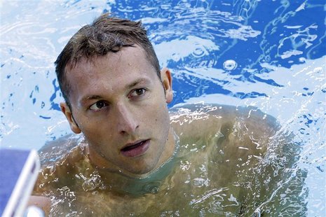 Australia's Ian Thorpe looks at the results board after competing in his men's 100m butterfly heat during the FINA Swimming World Cup in Sin Australia's Ian Thorpe looks at the results board after competing in his men's 100m butterfly heat during the FINA Swimming World Cup in Sin