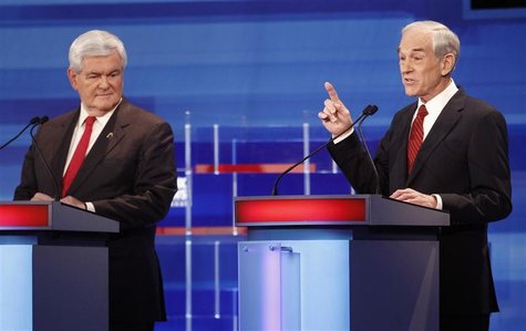 Republican presidential candidate Ron Paul makes a point as Newt Gingrich listens during the Republican Party presidential candidates debate Republican presidential candidate Ron Paul makes a point as Newt Gingrich listens during the Republican Party presidential candidates debate