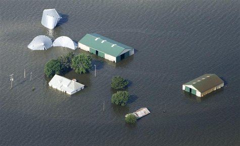 An aerial view of a farm north of Council Bluffs, Iowa, submerged in Missouri River flood waters An aerial view of a farm north of Council Bluffs, Iowa, submerged in Missouri River flood waters