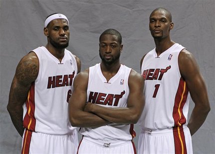 Miami Heat's LeBron James, Dwyane Wade and Chris Bosh pose during media day at the team's training camp in Miami Miami Heat's LeBron James, Dwyane Wade and Chris Bosh pose during media day at the team's training camp in Miami