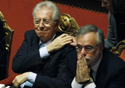 Italian Prime Minister Mario Monti smiles as he attends a confidence vote in Rome Italian Prime Minister Mario Monti smiles as he attends a confidence vote in Rome