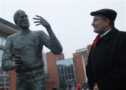 Bojar, chief of Hungarian software maker Graphisoft, who commissioned the sculpture stands next to the statue of Jobs during the unveiling c Bojar, chief of Hungarian software maker Graphisoft, who commissioned the sculpture stands next to the statue of Jobs during the unveiling c