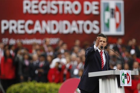 Nieto, a presidential candidate for the PRI, delivers a speech to his supporters on stage after filing for candidacy for his party in Mexico Nieto, a presidential candidate for the PRI, delivers a speech to his supporters on stage after filing for candidacy for his party in Mexico