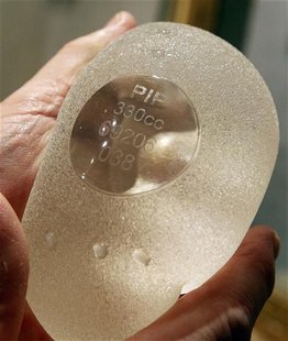 Plastic surgeon Boucq displays a silicone gel breast implant manufactured by French company Poly Implant Prothese (PIP) in a clinic in Nice Plastic surgeon Boucq displays a silicone gel breast implant manufactured by French company Poly Implant Prothese (PIP) in a clinic in Nice