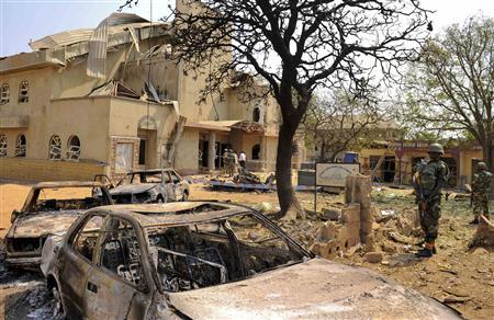 A view shows the scene of a bomb explosion at St. Theresa Catholic Church at Madalla, Suleja, just outside Nigeria's capital Abuja, December 25, 2011. Islamist militant group Boko Haram said it planted bombs that exploded on Christmas Day at churches in Nigeria, one of which killed at least 27 people on the outskirts of the capital.
Credit: Reuters/Afolabi Sotunde
A view shows the scene of a bomb explosion at St. Theresa Catholic Church at Madalla, Suleja, just outside Nigeria's capital Abuja, December 25, 2011. Islamist militant group Boko Haram said it planted bombs that exploded on Christmas Day at churches in Nigeria, one of which killed at least 27 people on the outskirts of the capital.
Credit: Reuters/Afolabi Sotunde