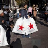 Black Friday shoppers cross 34th Street outside Macy's in Herald Square in New York Black Friday shoppers cross 34th Street outside Macy's in Herald Square in New York