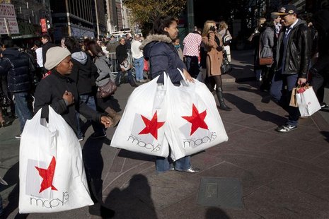 Black Friday shoppers cross 34th Street outside Macy's in Herald Square in New York Black Friday shoppers cross 34th Street outside Macy's in Herald Square in New York