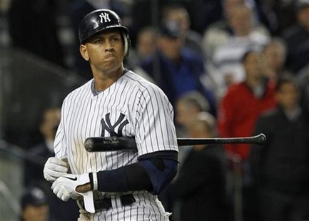 New York Yankees' Alex Rodriguez reacts after striking out with the bases loaded against the Detroit Tigers during the seventh inning of Gam New York Yankees' Alex Rodriguez reacts after striking out with the bases loaded against the Detroit Tigers during the seventh inning of Gam