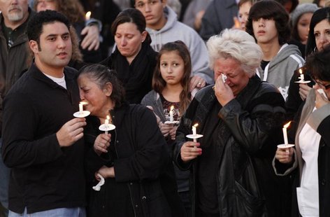 Relatives attend a candlelight vigil at Parr Park in Grapevine Relatives attend a candlelight vigil at Parr Park in Grapevine