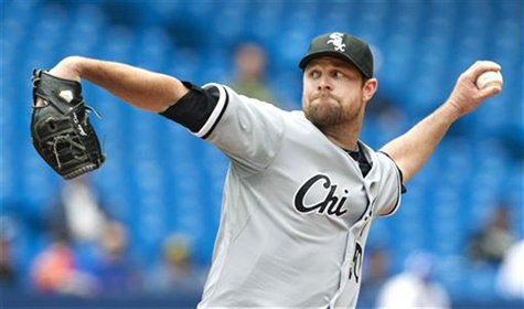 Chicago White Sox pitcher John Danks throws against the Toronto Blue Jays in Toronto. Chicago White Sox pitcher John Danks throws against the Toronto Blue Jays in Toronto.