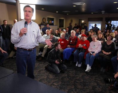 Republican presidential candidate Mitt Romney speaks during a campaign stop at the Family Table Restaurant in La Mars Republican presidential candidate Mitt Romney speaks during a campaign stop at the Family Table Restaurant in La Mars