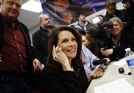 Republican presidential candidate and Representative Michele Bachmann makes a campaign phone call to a supporter from her office in Urbandal Republican presidential candidate and Representative Michele Bachmann makes a campaign phone call to a supporter from her office in Urbandal