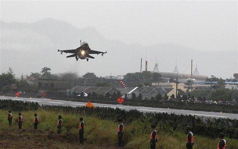 A Taiwan Air Force US-made F-16 fighter jet performs a low altitude flyby during a military drill in Jiadong, Pingtung County A Taiwan Air Force US-made F-16 fighter jet performs a low altitude flyby during a military drill in Jiadong, Pingtung County