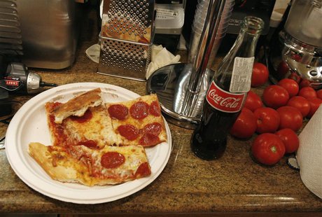 Pizza is served before a California Institute of Technology cooking class to curb the students' appetite while they work in Pasadena