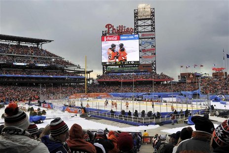 Spectators watch the Philadelphia Flyers and the New York Rangers play the NHL Winter Classic hockey game in Philadelphia Spectators watch the Philadelphia Flyers and the New York Rangers play the NHL Winter Classic hockey game in Philadelphia