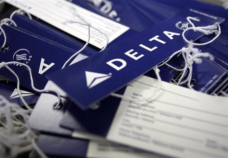 Delta airline name tags are seen at Delta terminal in JFK Airport in New York Delta airline name tags are seen at Delta terminal in JFK Airport in New York