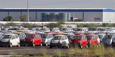 Tata Nano automobiles are seen parked at the carmaker's plant in Sanand, Gujarat state, September 26, 2011. Tata Nano automobiles are seen parked at the carmaker's plant in Sanand, Gujarat state, September 26, 2011.