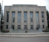 Kalamazoo City Hall sits in Downtown Kalamazoo in a stock image.