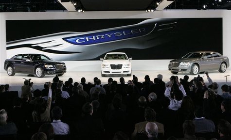 Chrysler 300 cars are displayed on stage during the press day for the North American International Auto show in Detroit Chrysler 300 cars are displayed on stage during the press day for the North American International Auto show in Detroit