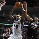 Memphis Grizzlies center Randolph shoots defended by Miami Heat forwards Bosh and James during the second half of NBA basketball action in M